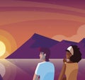 interracial couple contemplating horizon of sky sunset scene