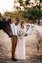 Interracial couple newlyweds at the ranch. Royalty Free Stock Photo