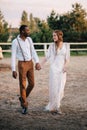 Interracial couple newlyweds at the ranch. Royalty Free Stock Photo