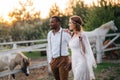 Interracial couple newlyweds at the ranch. Royalty Free Stock Photo