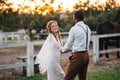 Interracial couple newlyweds at the ranch. Royalty Free Stock Photo