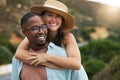 Interracial couple, trip and happy for hug in nature, travel and countryside for vacation in Brazil. Adventure, people