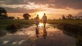 Interracial Couple Walking In A Country At Sunset Royalty Free Stock Photo