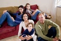 Interracial family of five relaxing at home Royalty Free Stock Photo