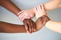 interracial human hands keeping in chains for friendship and love Royalty Free Stock Photo