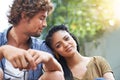 Interracial, lovers or couple for bonding, love or affection outside in garden, backyard or patio. Male person Royalty Free Stock Photo