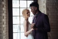 Interracial tender wedding couple. Young african american man and caucasian woman rehearse wedding dance. Mixed-race