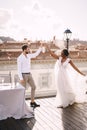 Interracial wedding couple. Destination fine-art wedding in Florence, Italy. African-American bride and Caucasian groom