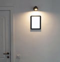 Interrior photo with lamp , door and mock up frame with place for text or picture on the wall. Minimalistic style