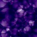 Intersecting dark purple circles and balls.