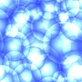 Intersecting light blue circles and balls.