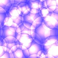Intersecting light purple circles and balls.