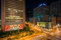 The intersection of Lombard & Light Streets at night, in downtown Baltimore, Maryland