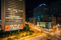 The intersection of Lombard & Light Streets at night, in downtown Baltimore, Maryland