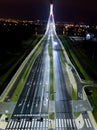 intersection at night from the drone wet road, road lighting wet road, road lighting cars road lanes