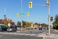 Intersection in Ottawa, Canada with traffic lights, crosswalk and cars on the road Royalty Free Stock Photo