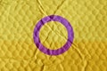 Intersex pride flag on an uneven textured surface