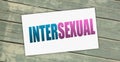 Intersexual word on card on wooden table. social diversity Gender LGBTQ concept