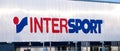 InterSport sign on the facade of a warehouse..