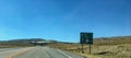 Interstate directional signs before an onramp near Evanston, Wyoming