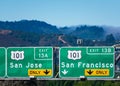 Interstate 101 highway road sign showing drivers the directions to San Jose and San Francisco in Silicon Valley. Green hills with Royalty Free Stock Photo