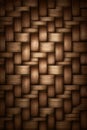 Intertwined brown wicker creating a textured pattern. Woven strips form a seamless abstract background with depth Royalty Free Stock Photo