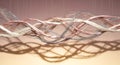 Intertwined soft textile waves cast a dramatic shadow Royalty Free Stock Photo