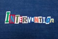 INTERVENTION text word collage, colorful fabric on blue denim, addiction and recovery concept Royalty Free Stock Photo