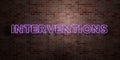 INTERVENTIONS - fluorescent Neon tube Sign on brickwork - Front view - 3D rendered royalty free stock picture Royalty Free Stock Photo