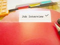 Interview appointment or seeking for job concept with stationery background. Royalty Free Stock Photo