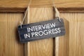 Interview in progress sign on office door Royalty Free Stock Photo