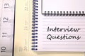 Interview questions write on notebook Royalty Free Stock Photo