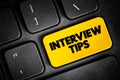 Interview Tips text button on keyboard, concept background Royalty Free Stock Photo