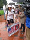 Interview of Woman Counter Protester With Sign