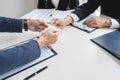 Interviewer or Board reading a resume during job interview, Employer interviewing a young male job seeker for recruitment talking Royalty Free Stock Photo