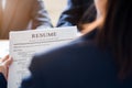 Interviewer reading a resume, Person submits job application, Person describe yourself to interviewer, Close up view of job Royalty Free Stock Photo