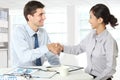 Interviewer shaking hand to future employee Royalty Free Stock Photo