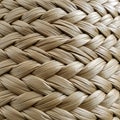 Interwoven pattern of braided natural fibers in light brown, showcasing a tight, texture Royalty Free Stock Photo