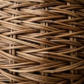 Interwoven pattern of brown wicker strands, creating a textured, repeating design. The Royalty Free Stock Photo