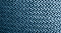 Interwoven pattern composed of blue, parallel strips creating a crisscross design. The Royalty Free Stock Photo