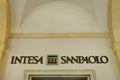 Intesa San Paolo financial and banking company ancient sign on headquarters building facade