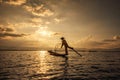 Intha Burmese fishermen on boat catching fish traditional at Inle Lake Royalty Free Stock Photo