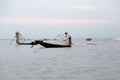 Inle Lake Myanmar 12/16/2015 Intha fisherman using traditional cone fishing net