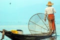 Intha fishermen working in the morning. Location of Inle lake, Myanmar.