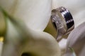 Intimate Elegance: Wedding Band and Calla Lily