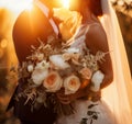 Romantic Sunset Embrace of Wedding Couple Royalty Free Stock Photo