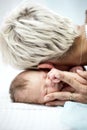 Intimate portrait of newborn baby boy hugged by his mother Royalty Free Stock Photo