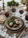 An intimate setting of Passover Seder with wine glasses, matzah, and a traditional Seder plate on a lace tablecloth. Royalty Free Stock Photo