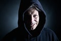 Intimidating Distinguished Man in Hooded Top Royalty Free Stock Photo