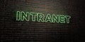 INTRANET -Realistic Neon Sign on Brick Wall background - 3D rendered royalty free stock image